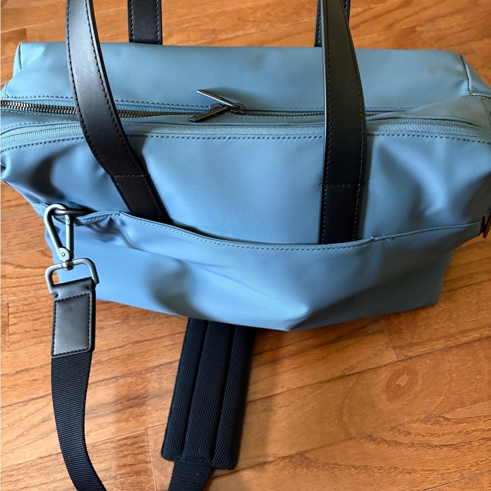 Away Blue and Black Travel Bag with Durable Design